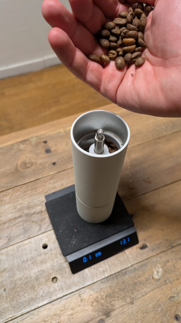 Closeup of the Timemore Chestnur c3 grinder on a Timemore blackmirror nano scale.